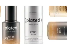 Plated Skin Science hair serum and daily serum bottles with skin care