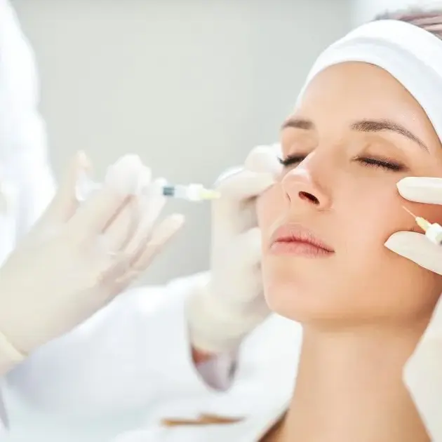 Woman receiving Botox or Daxxify injections from a specialist in Parker, CO